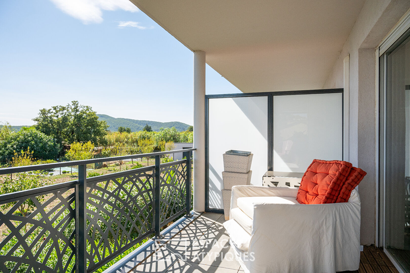 Modern apartment with its terrace overlooking nature