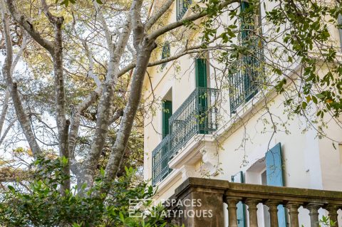 19th century house suspended in a bubble of greenery at Cap Brun