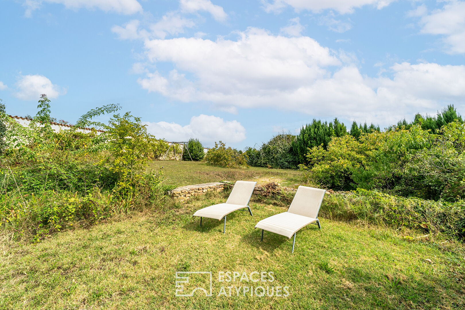 Maison familiale avec jardin arboré