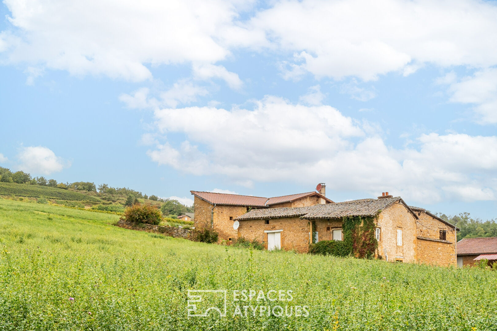 Golden stone house with great potential