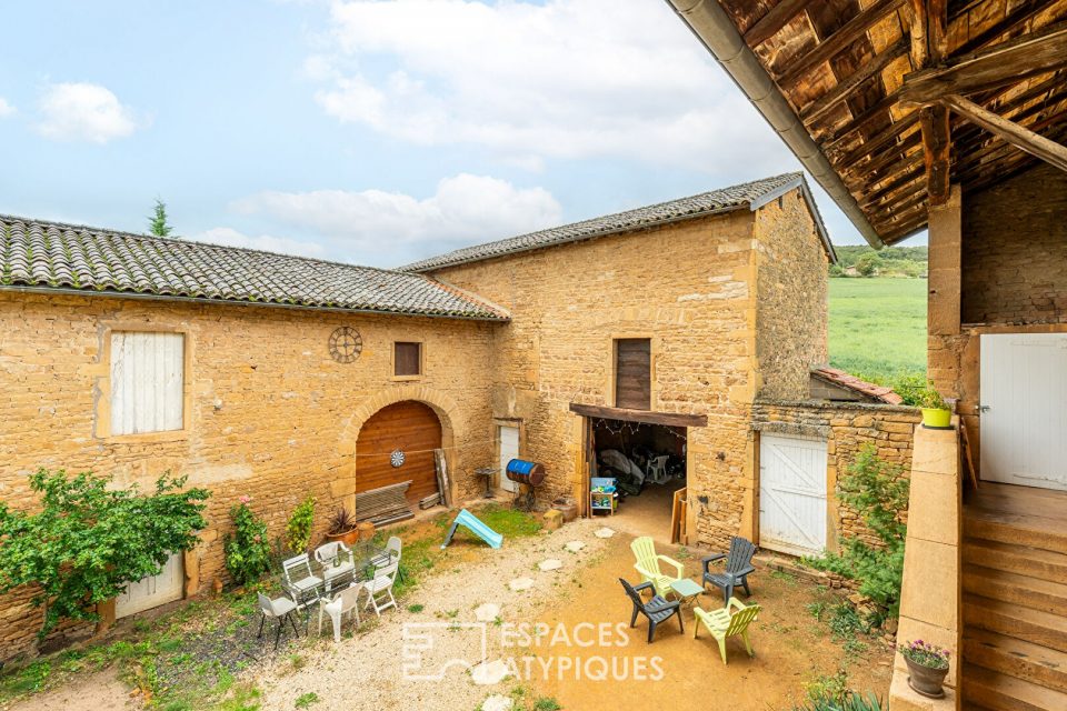 Maison en pierres dorées avec fort potentiel