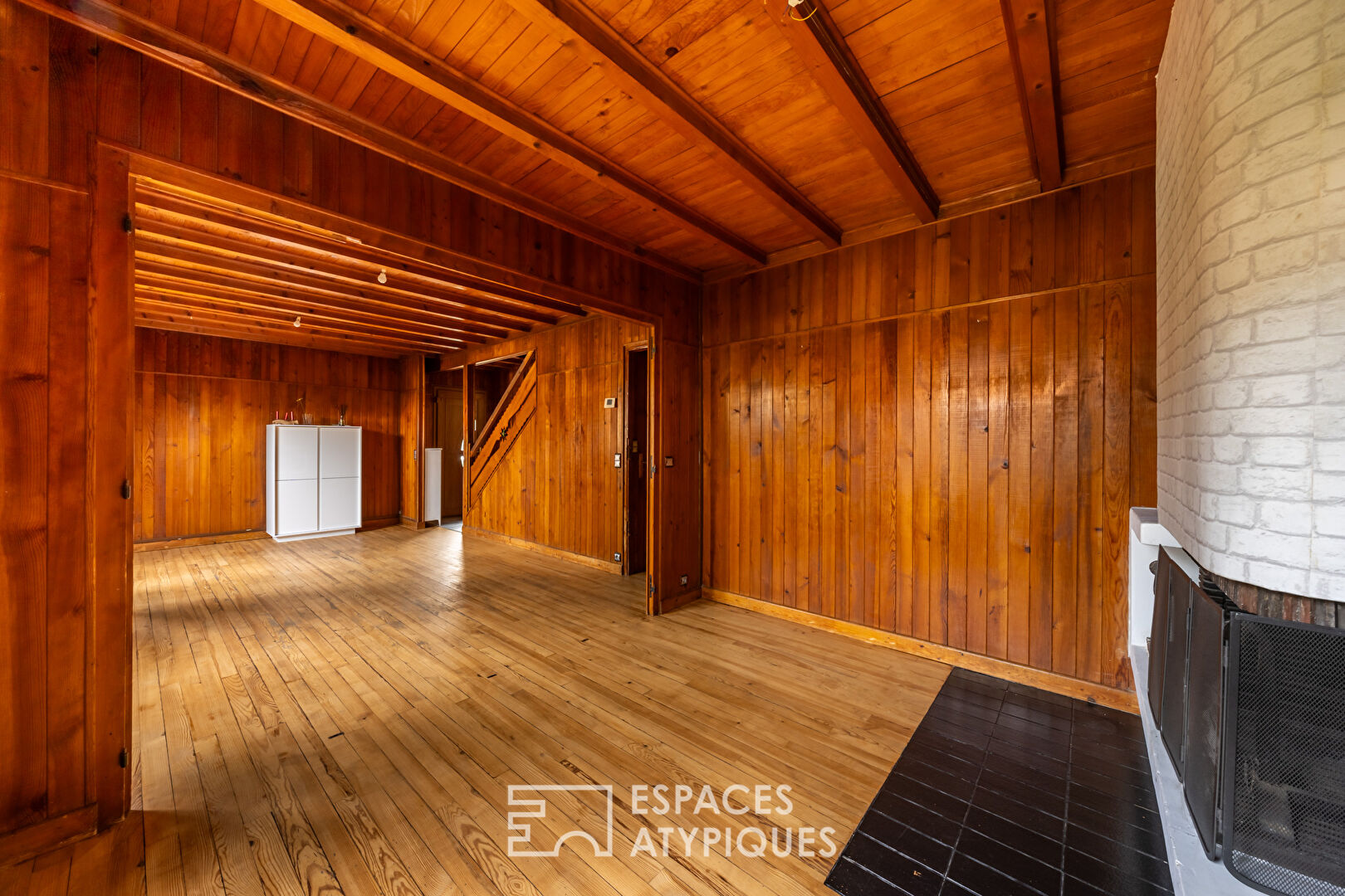 La maison familiale en bois.