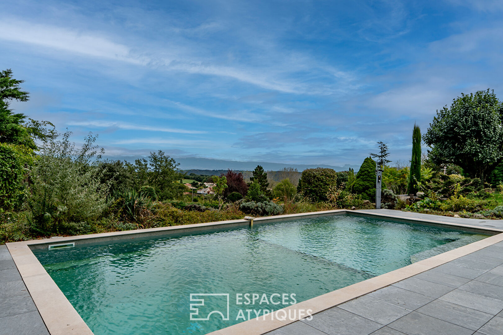 A family home in the Ardèche boasts unusual charm, panoramic views and building land.