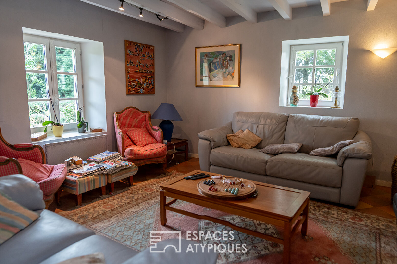 A family home in the Ardèche boasts unusual charm, panoramic views and building land.