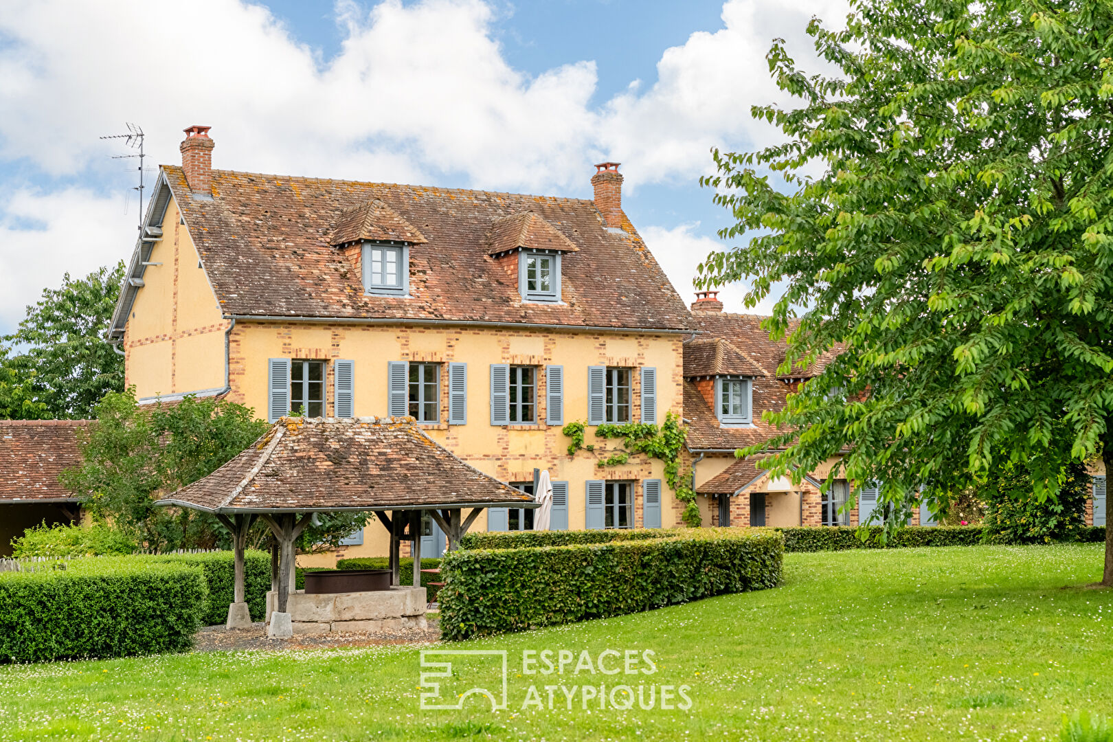 Propriété de campagne en coeur de ville