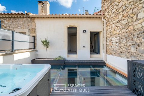 Village house with glass terrace