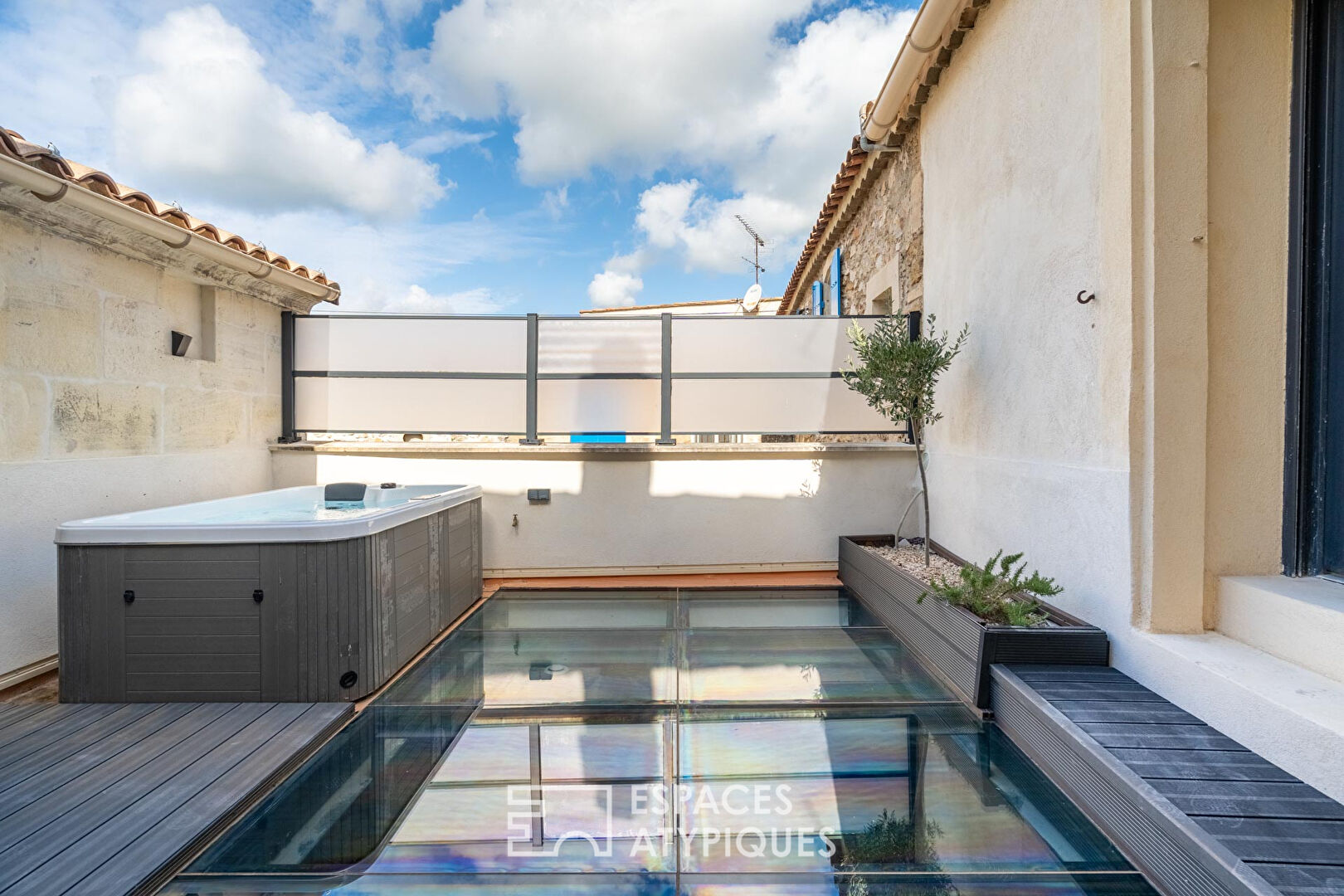 Village house with glass terrace