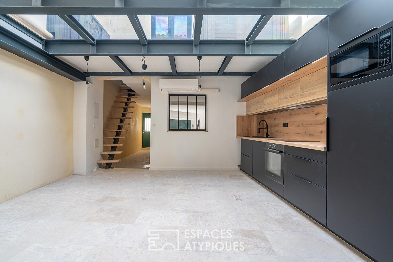 Village house with glass terrace