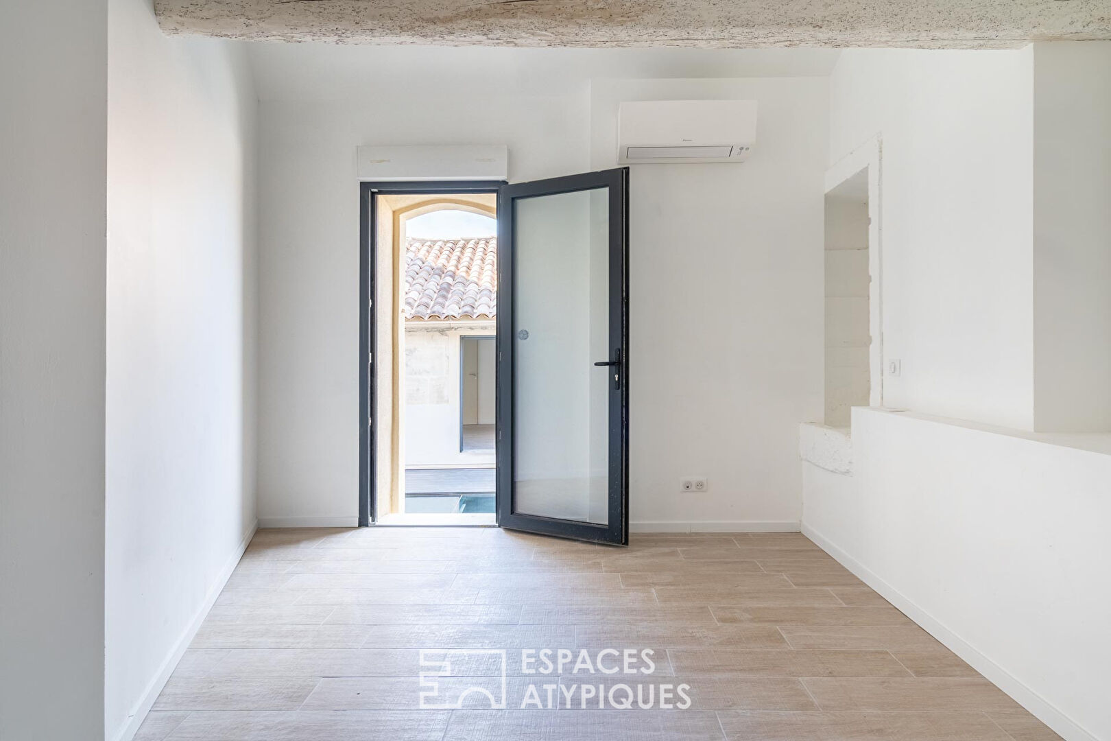 Village house with glass terrace