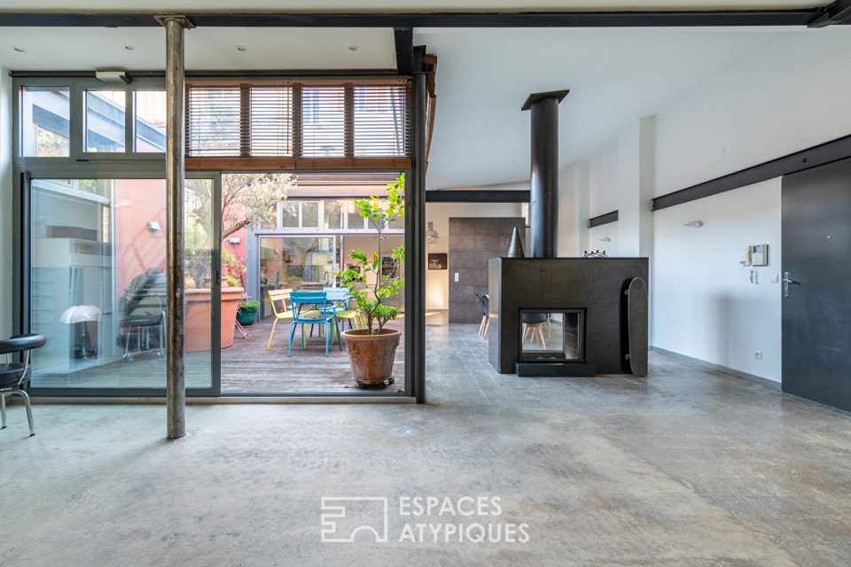 Loft d'architecte avec extérieur dans une ancienne manufacture