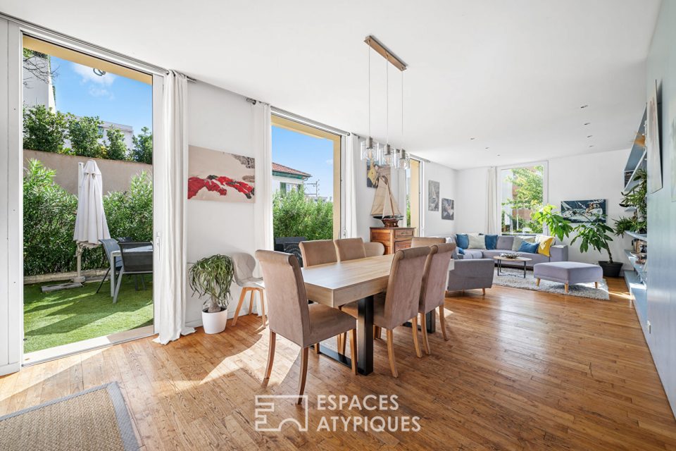 Appartement atypique de 131m² avec jardin, piscine et garage double