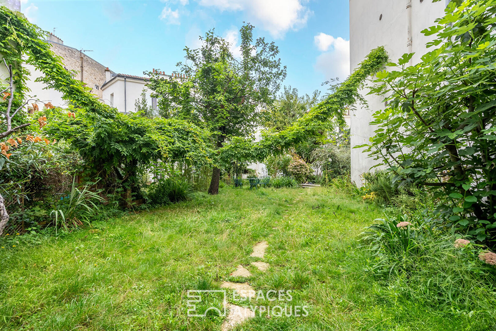 Duplex avec jardin partagé