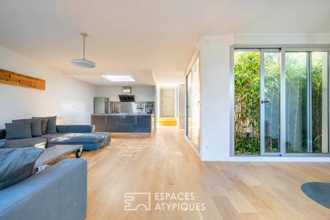 Maison d’architecte de plain pied avec terrasse et patios