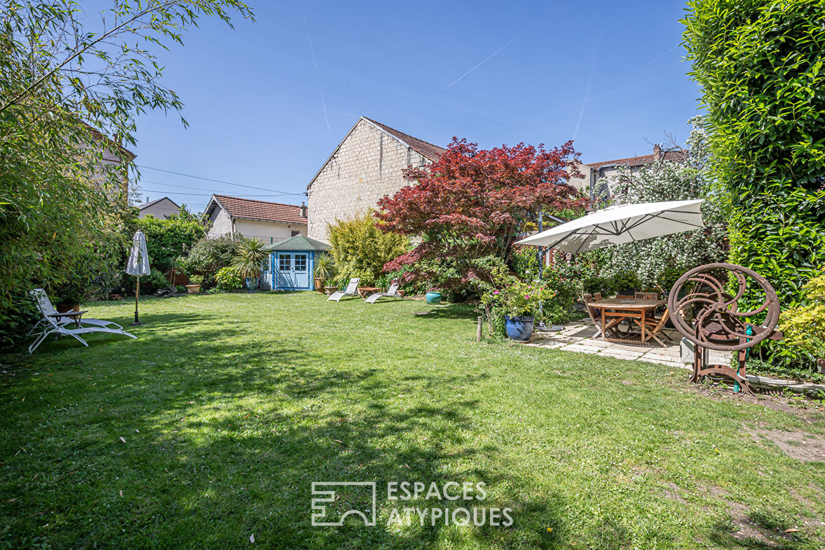 Late 19th century millstone with garden and terrace