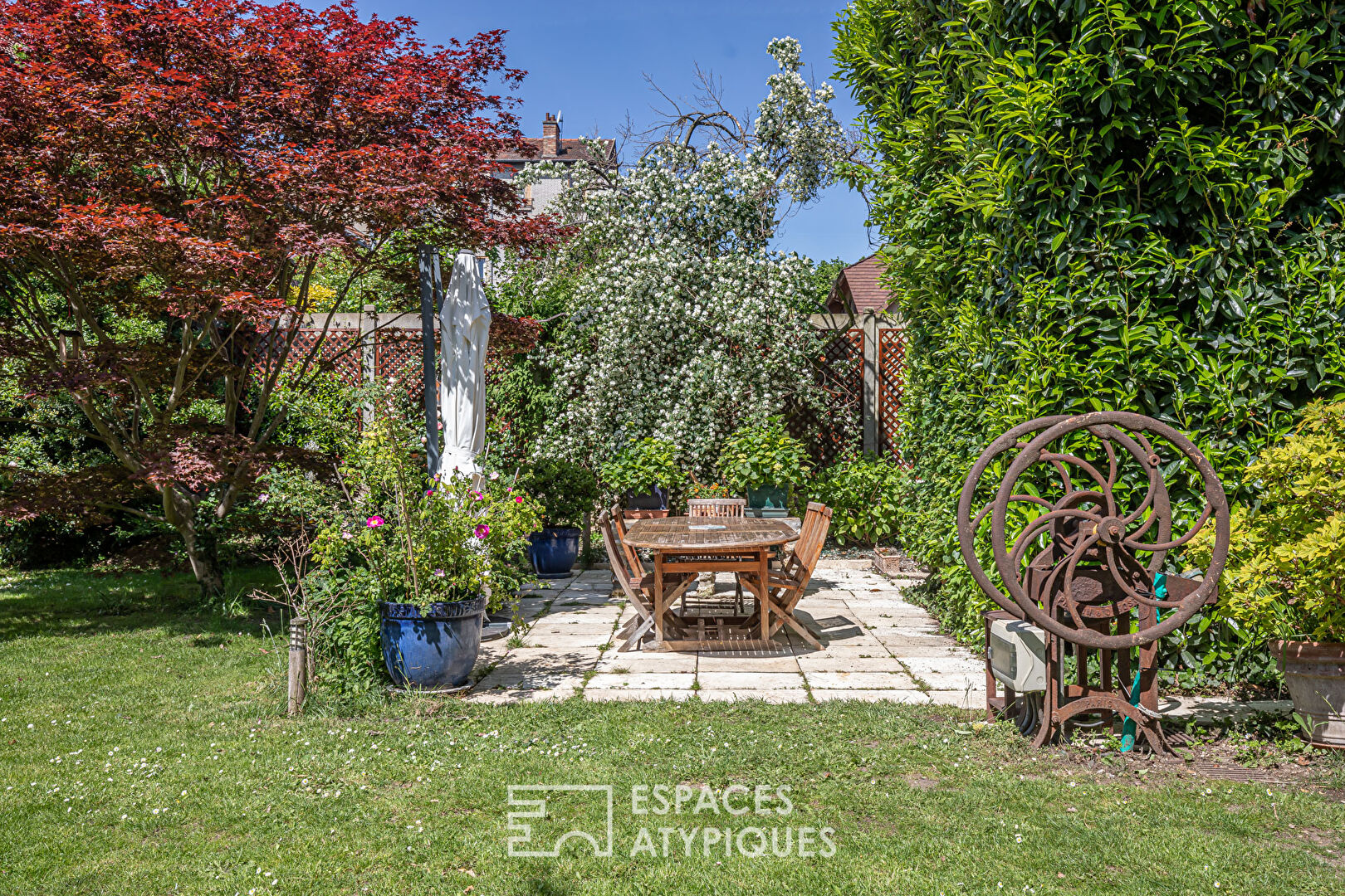 Late 19th century millstone with garden and terrace