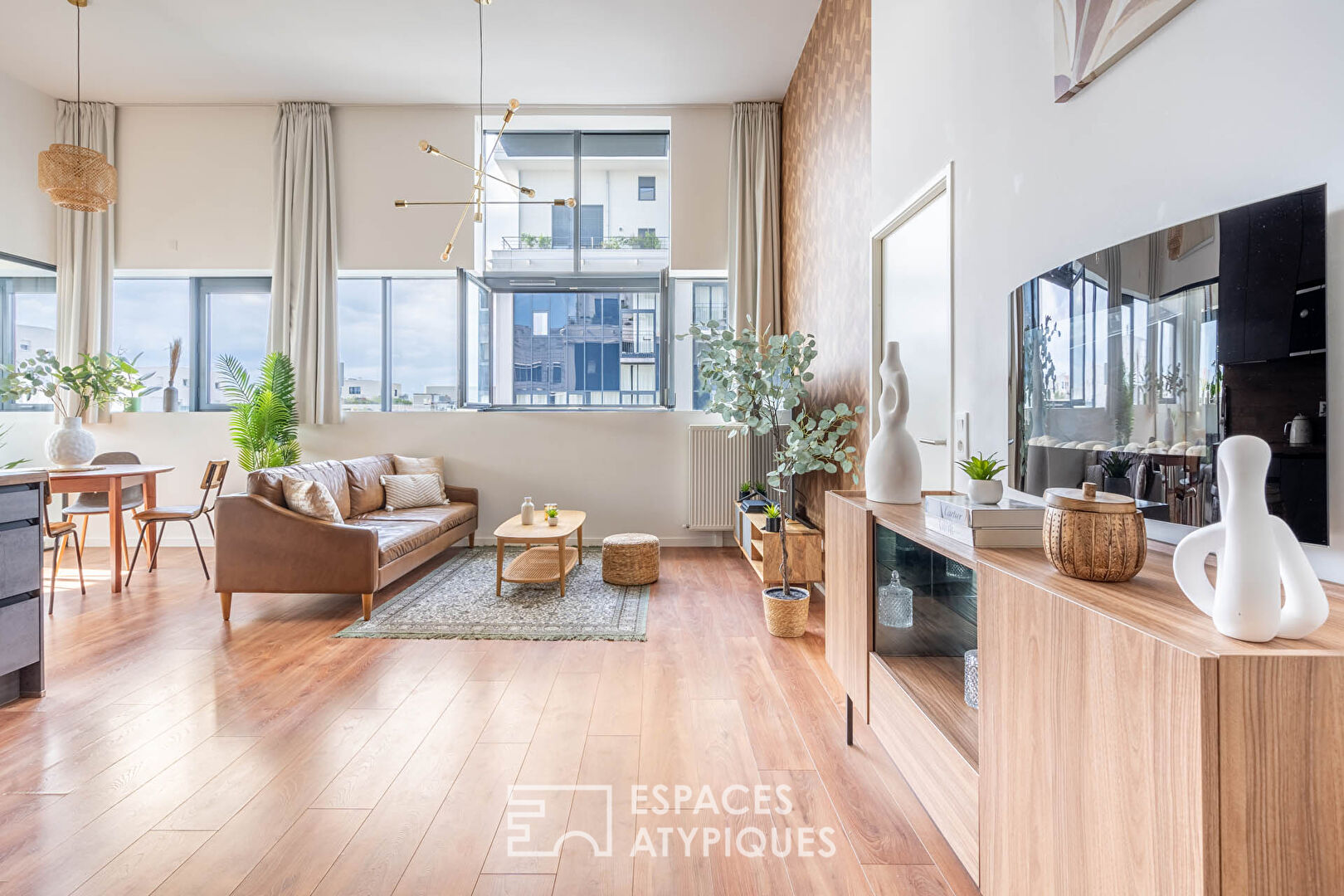 Contemporary loft with cathedral living room