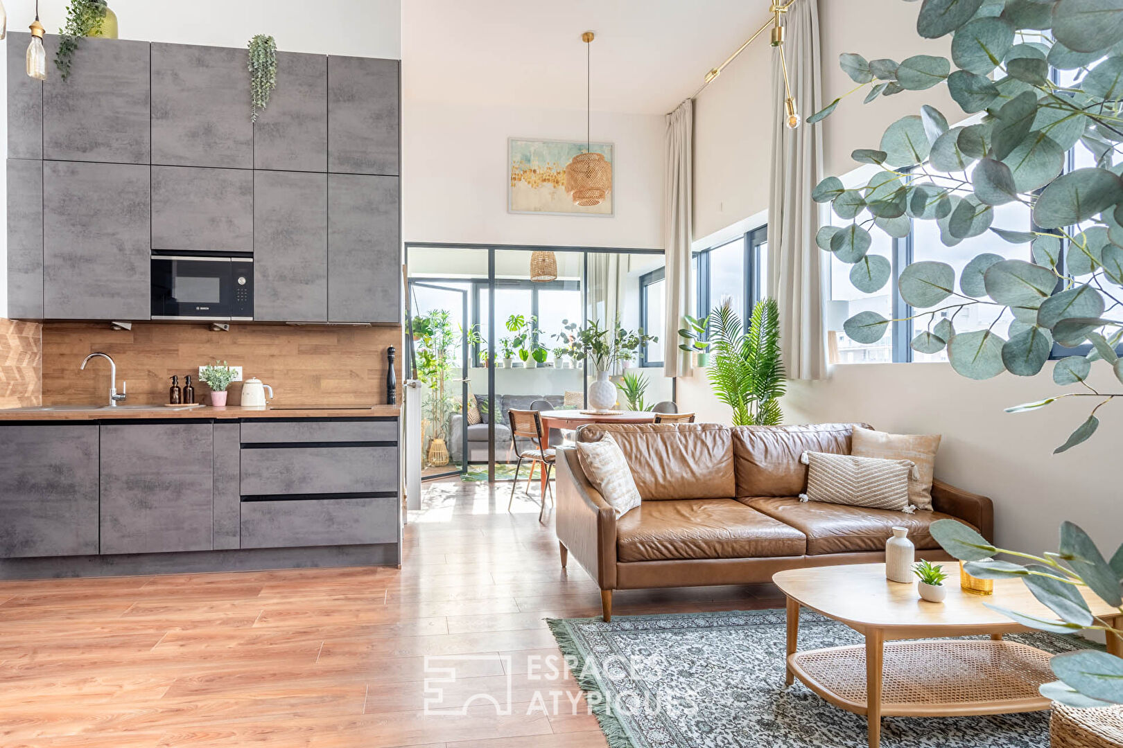 Contemporary loft with cathedral living room