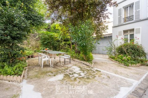 Appartement avec mezzanine sur cour arborée