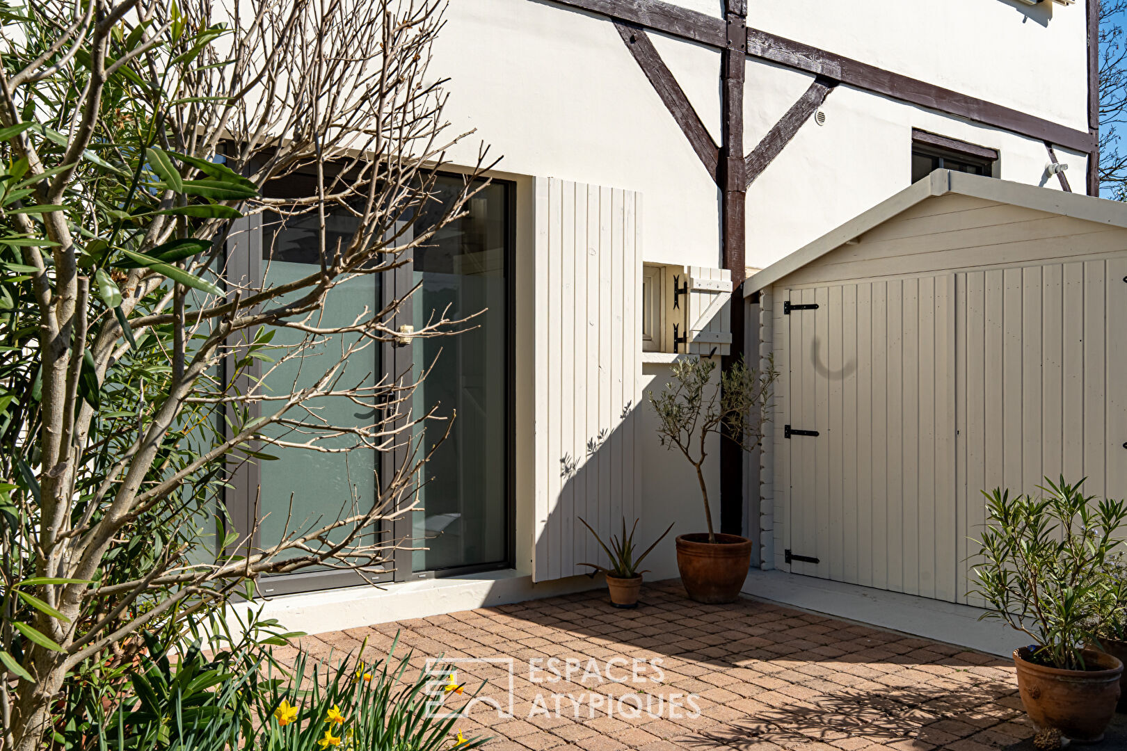 Maison-loft avec jardin et terrasse dans ancienne imprimerie