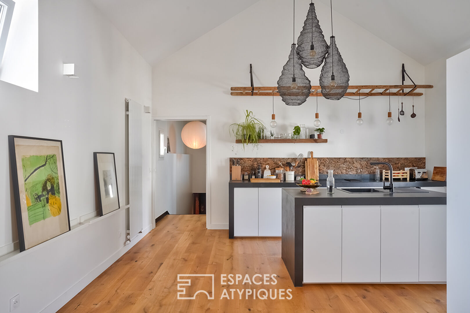 Former marble works renovated into a townhouse with two apartments.