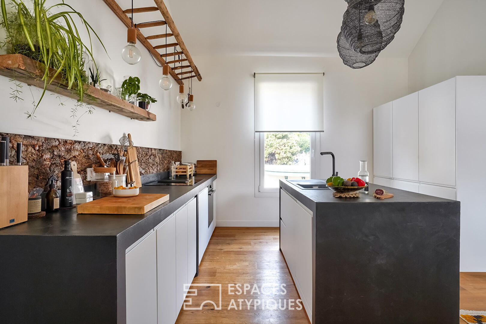 Former marble works renovated into a townhouse with two apartments.