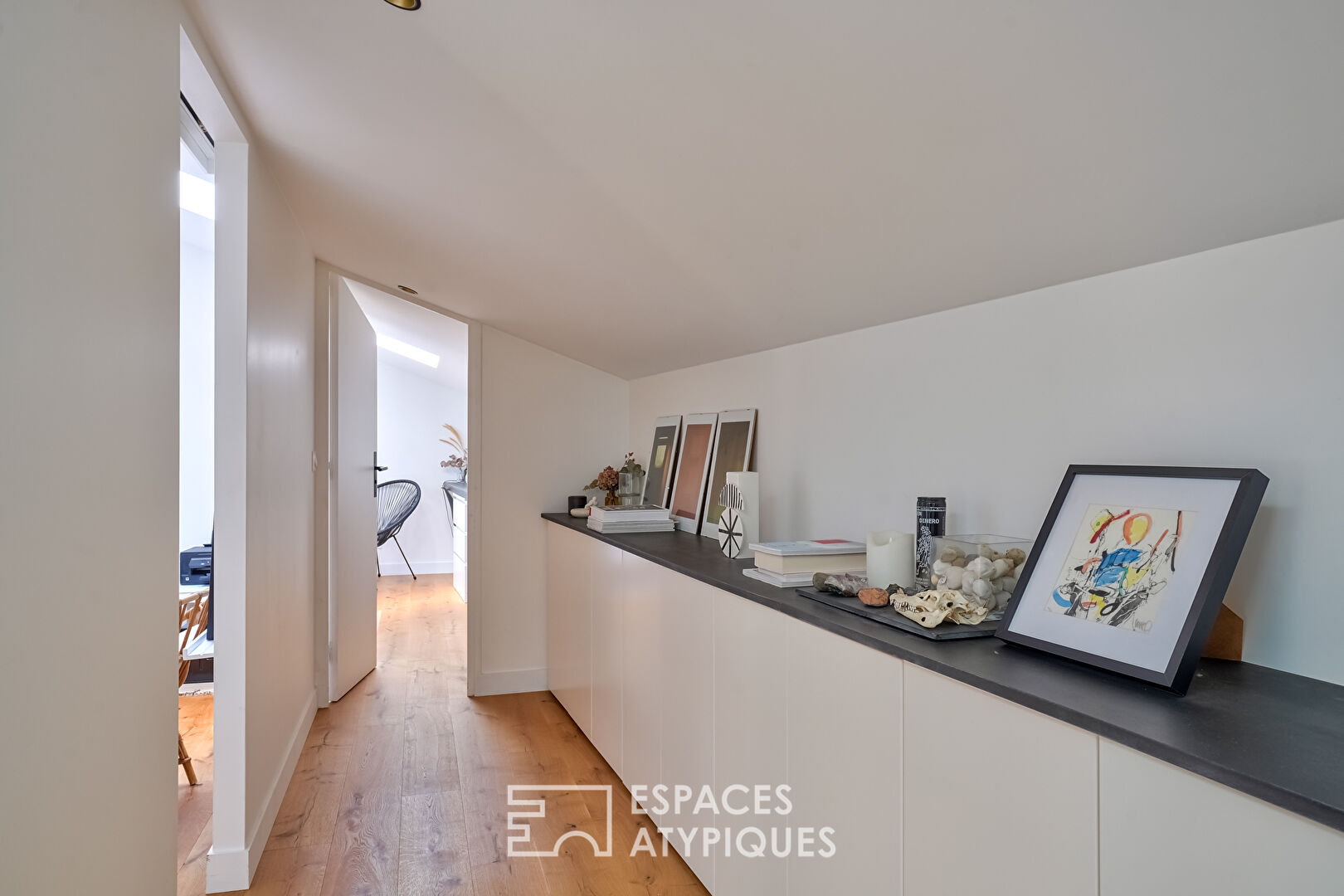 Former marble works renovated into a townhouse with two apartments.