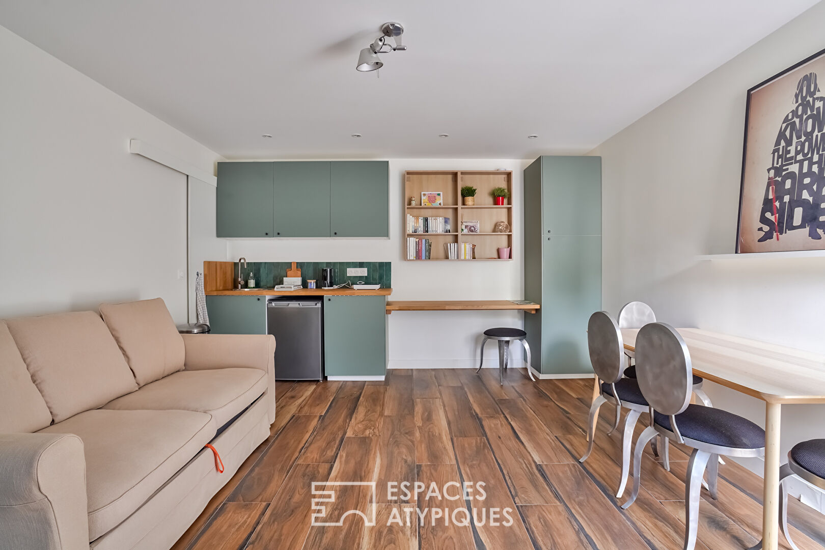 Former marble works renovated into a townhouse with two apartments.