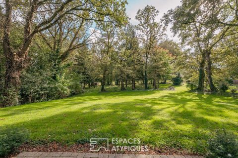 Ensemble de deux maisons dans son parc arboré