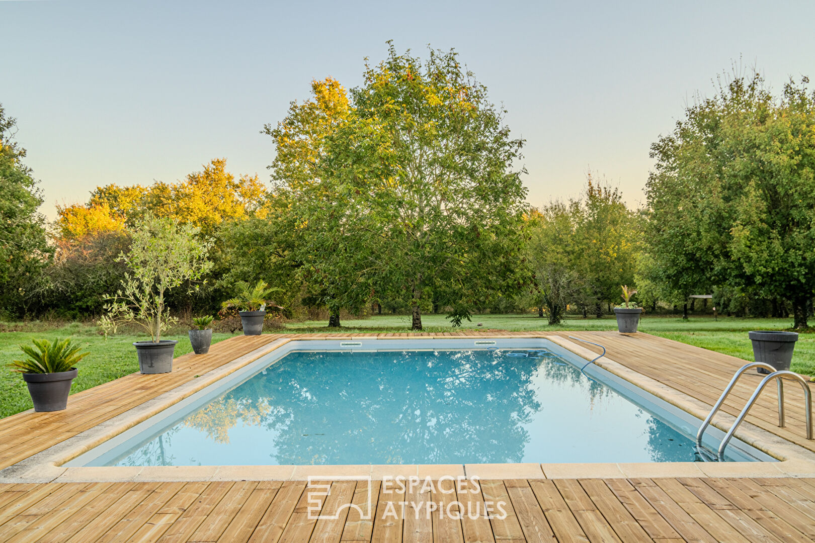 Maison familiale en pierre dans son parc arboré de 1,3 hectares