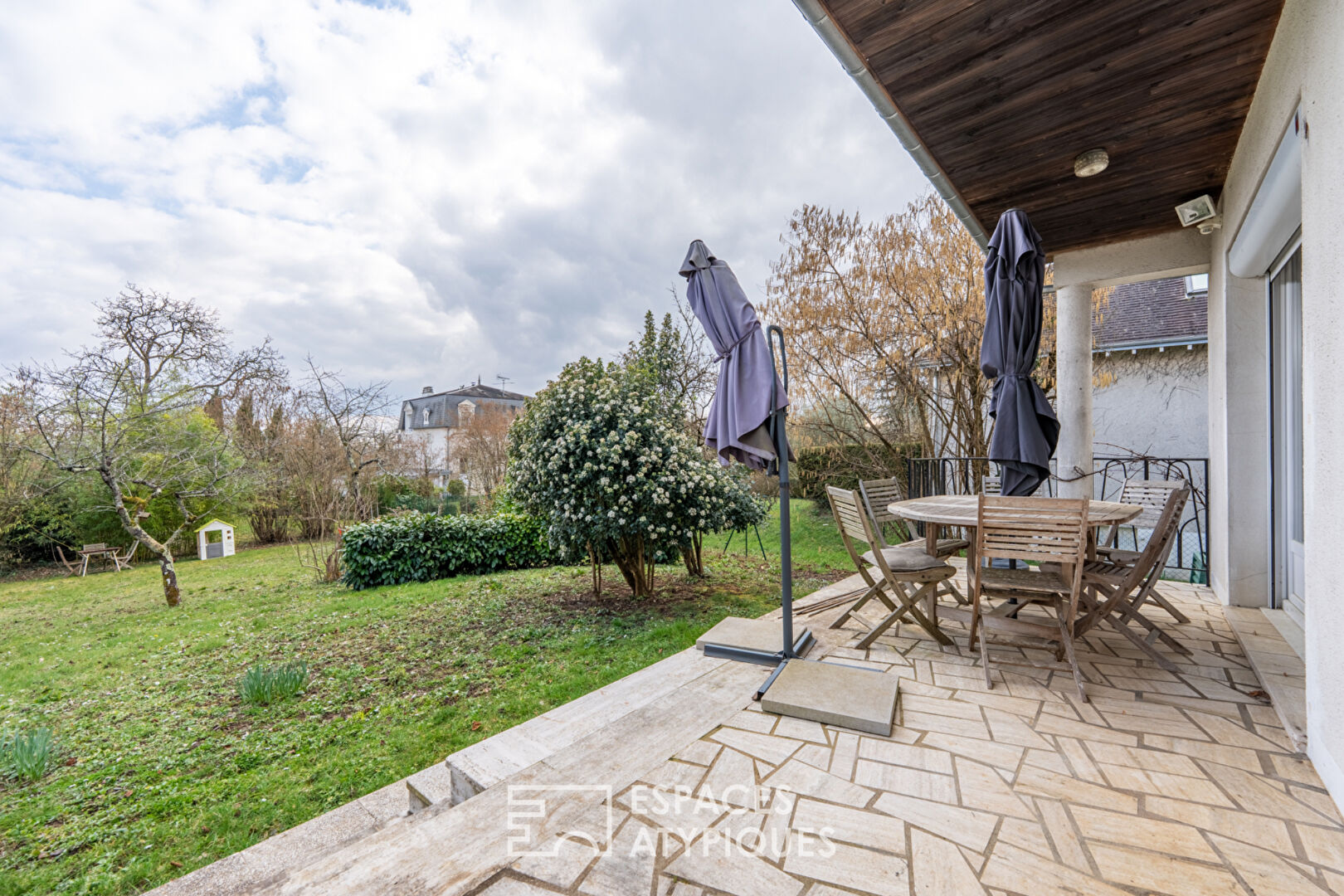 Bright house with wooded garden