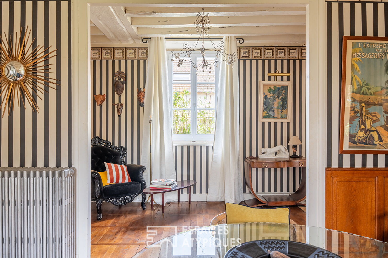 L’élégante maison de maître et son jardin arboré