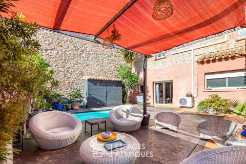 Magnifique maison vigneronne avec jardin paysagé et piscine.