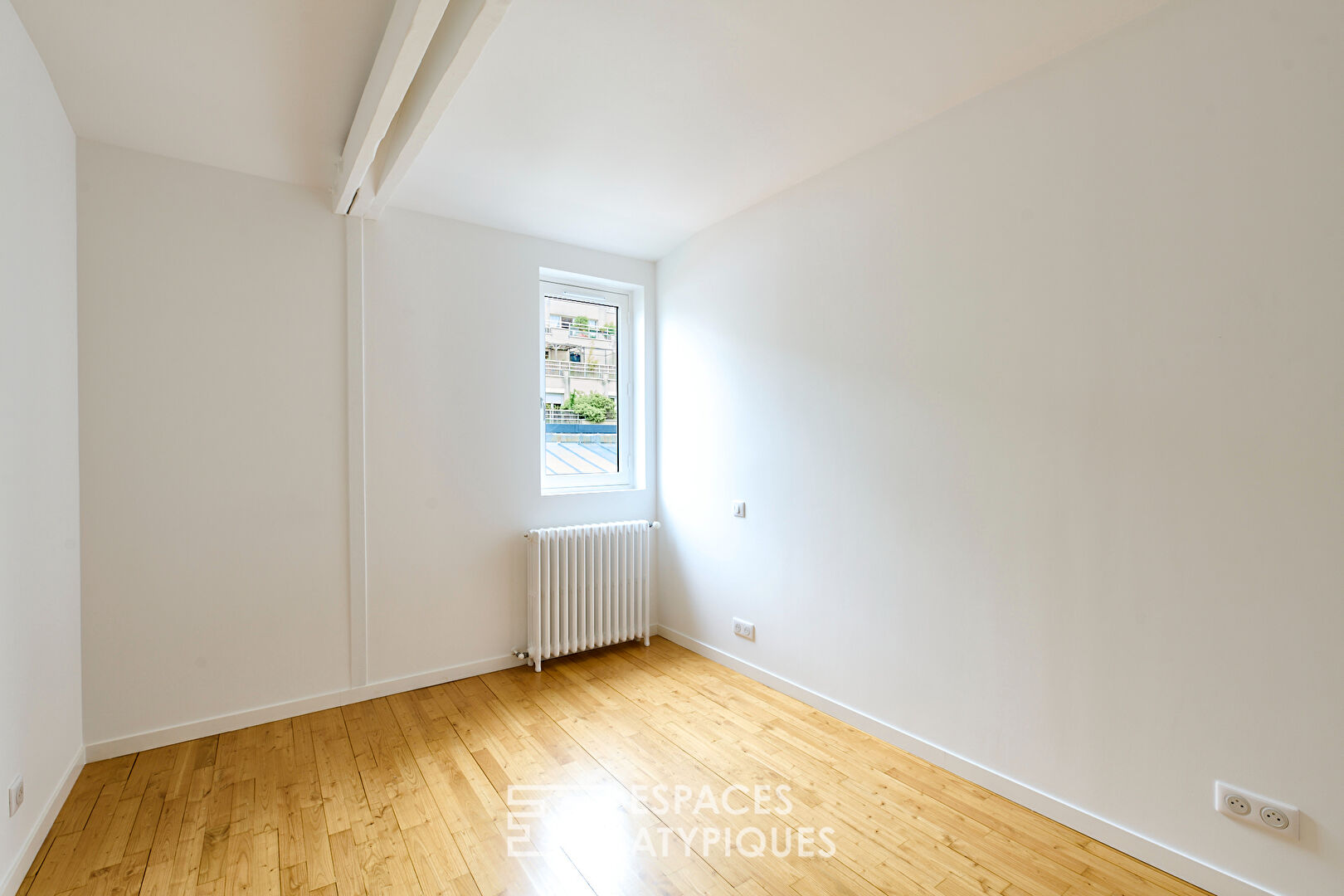 Top floor apartment with terrace in the heart of the Cité du Figuier