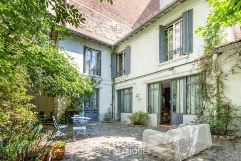 House with garden and terraces