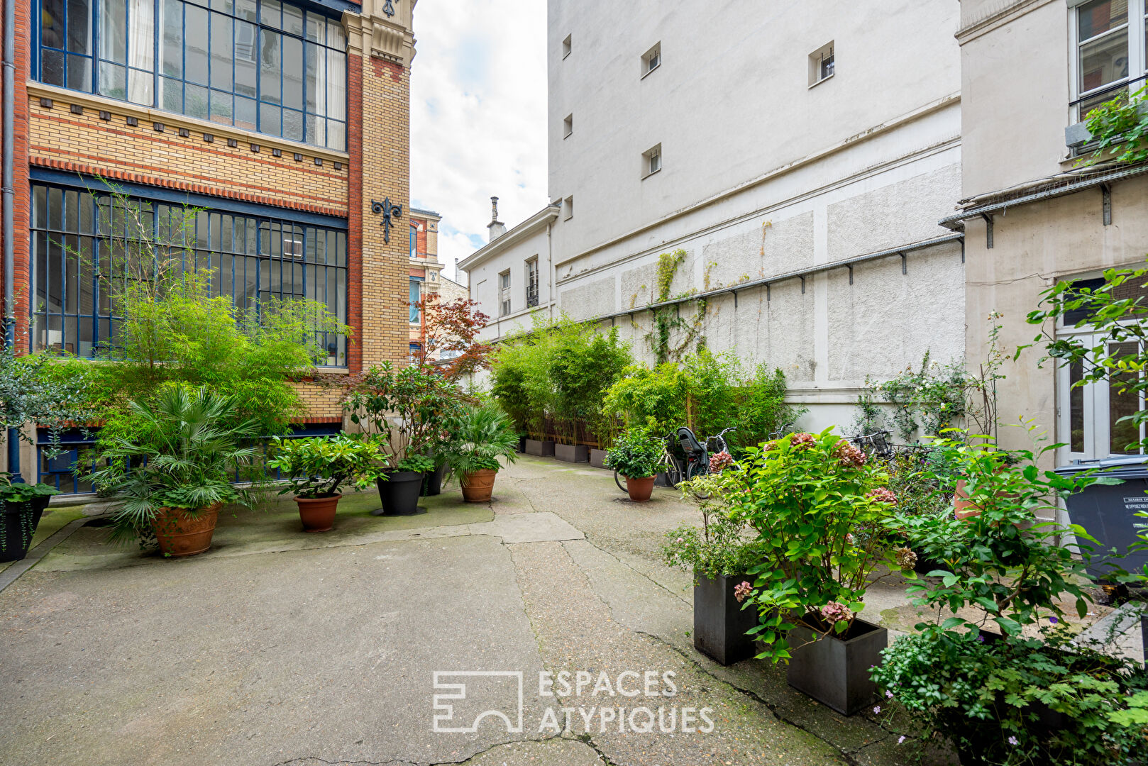 Dernier étage en duplex avec vue sur les toits