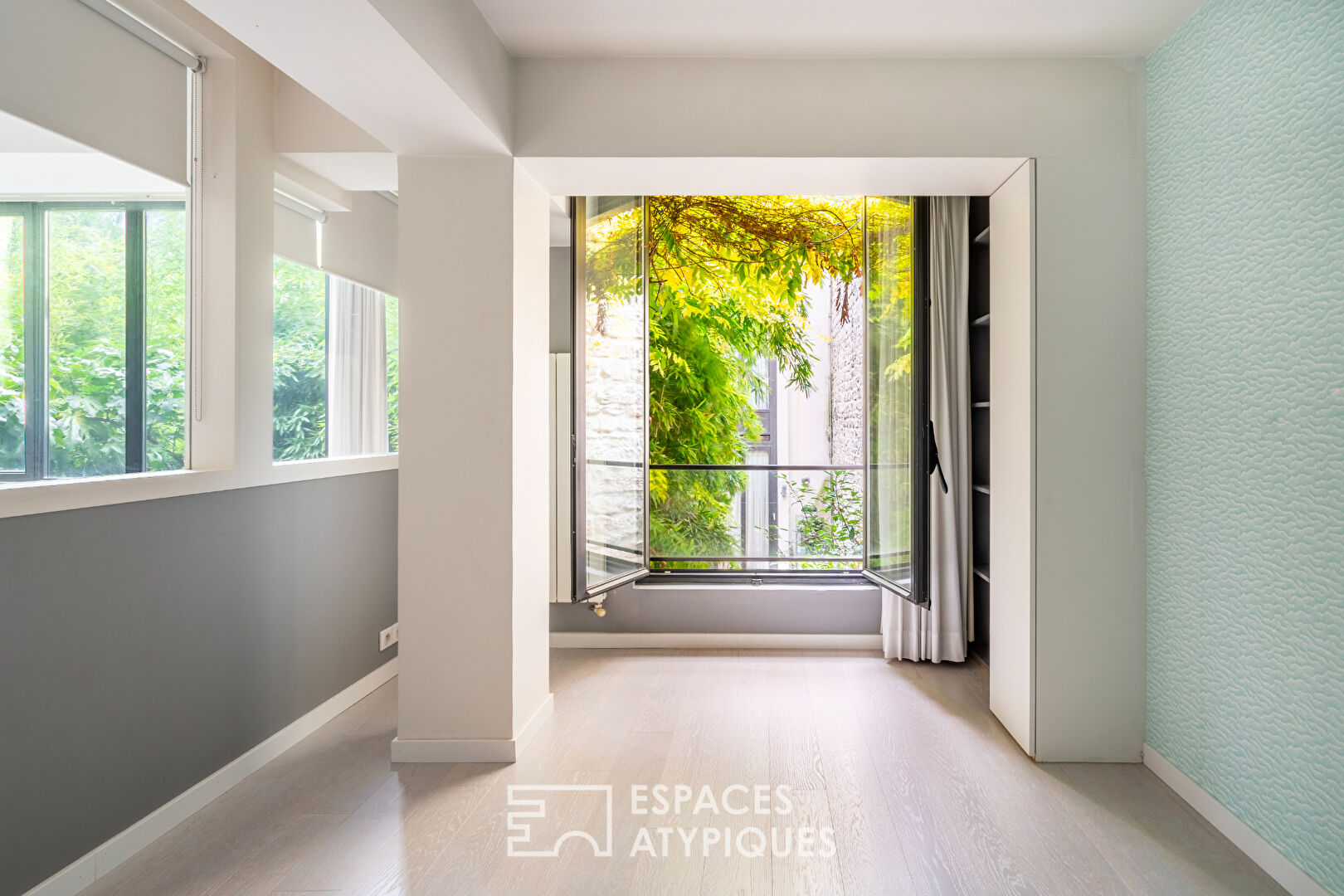 Loft en duplex avec terrasse arborée