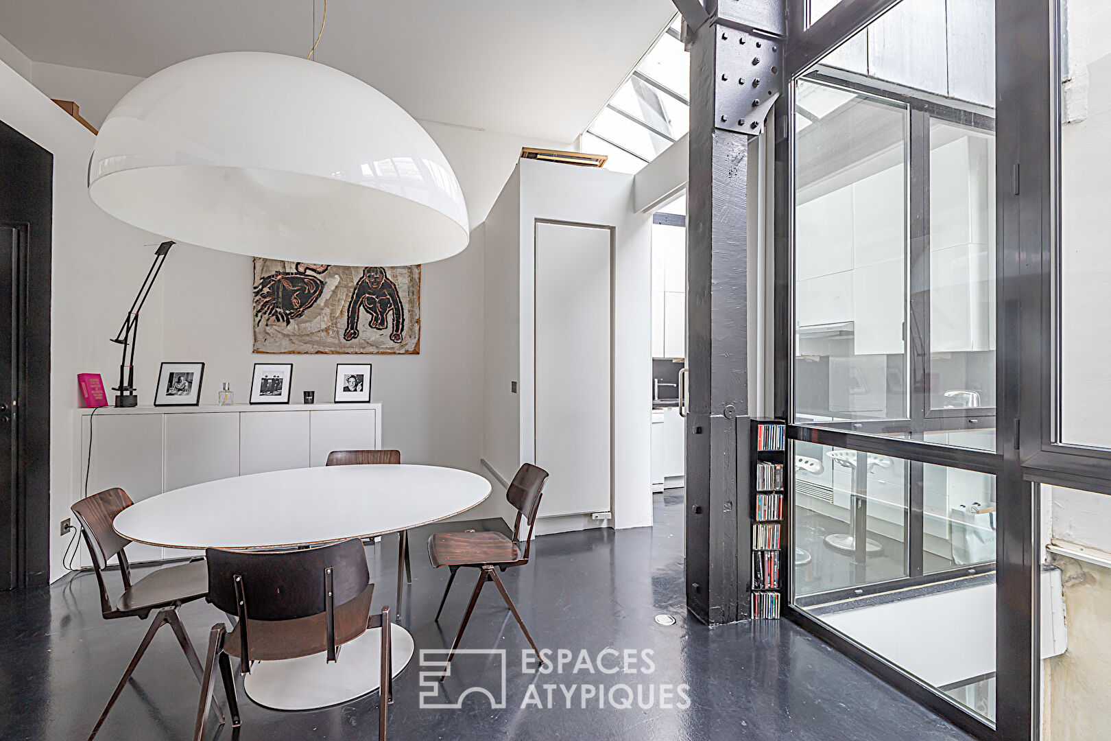 Monochrome duplex loft with patios