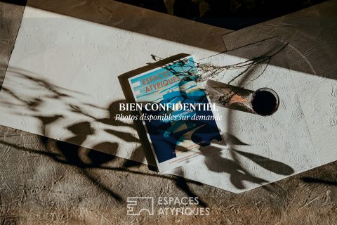 Loft avec verrière dans un hôtel particulier classé du Marais