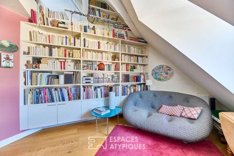 Appartement à l’esprit atelier d’artiste avec vue sur les toits de Paris et le Centre Pompidou