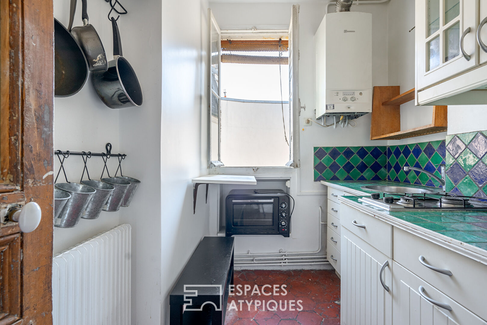 Haussmannian apartment with balcony and open view