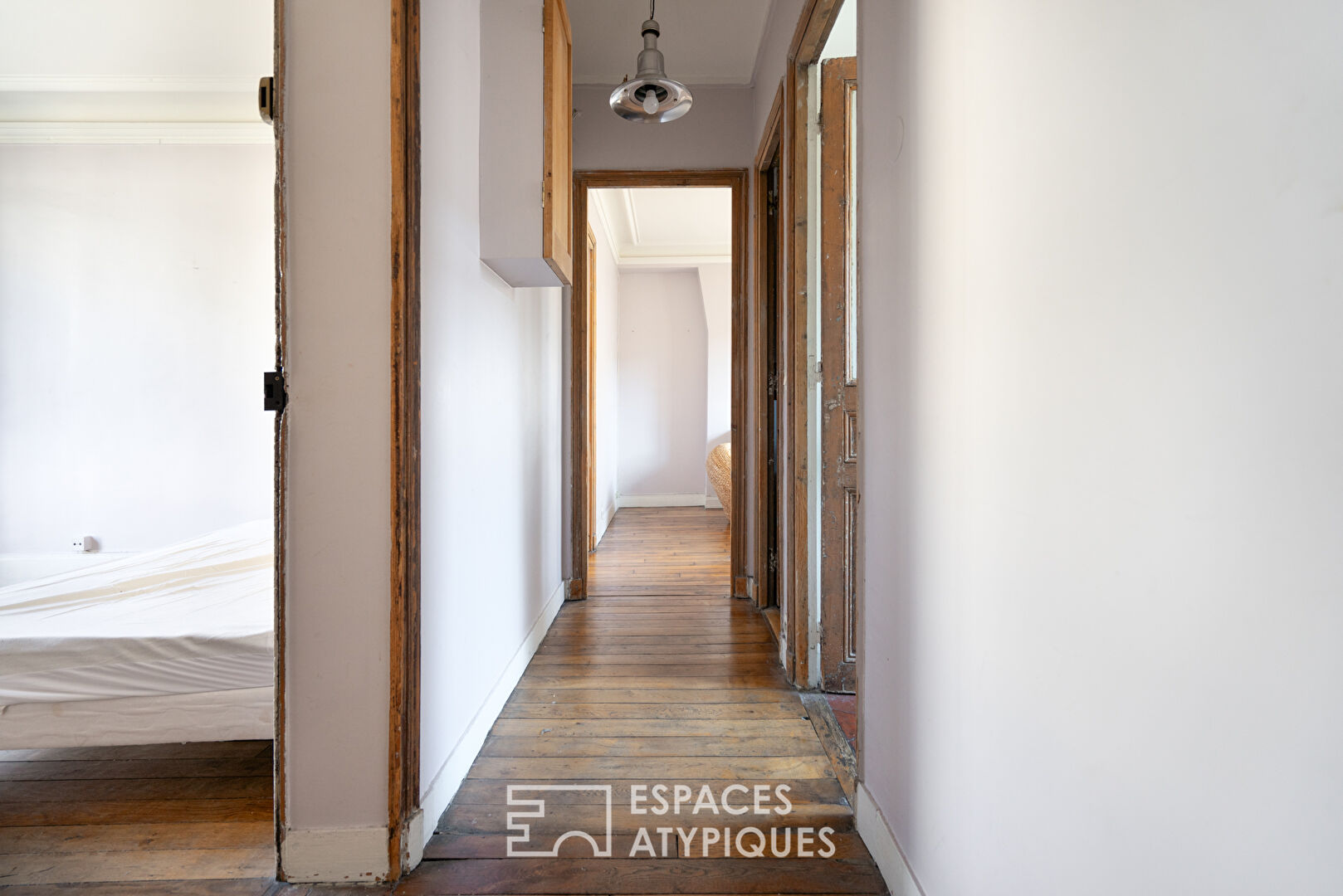 Haussmannian apartment with balcony and open view