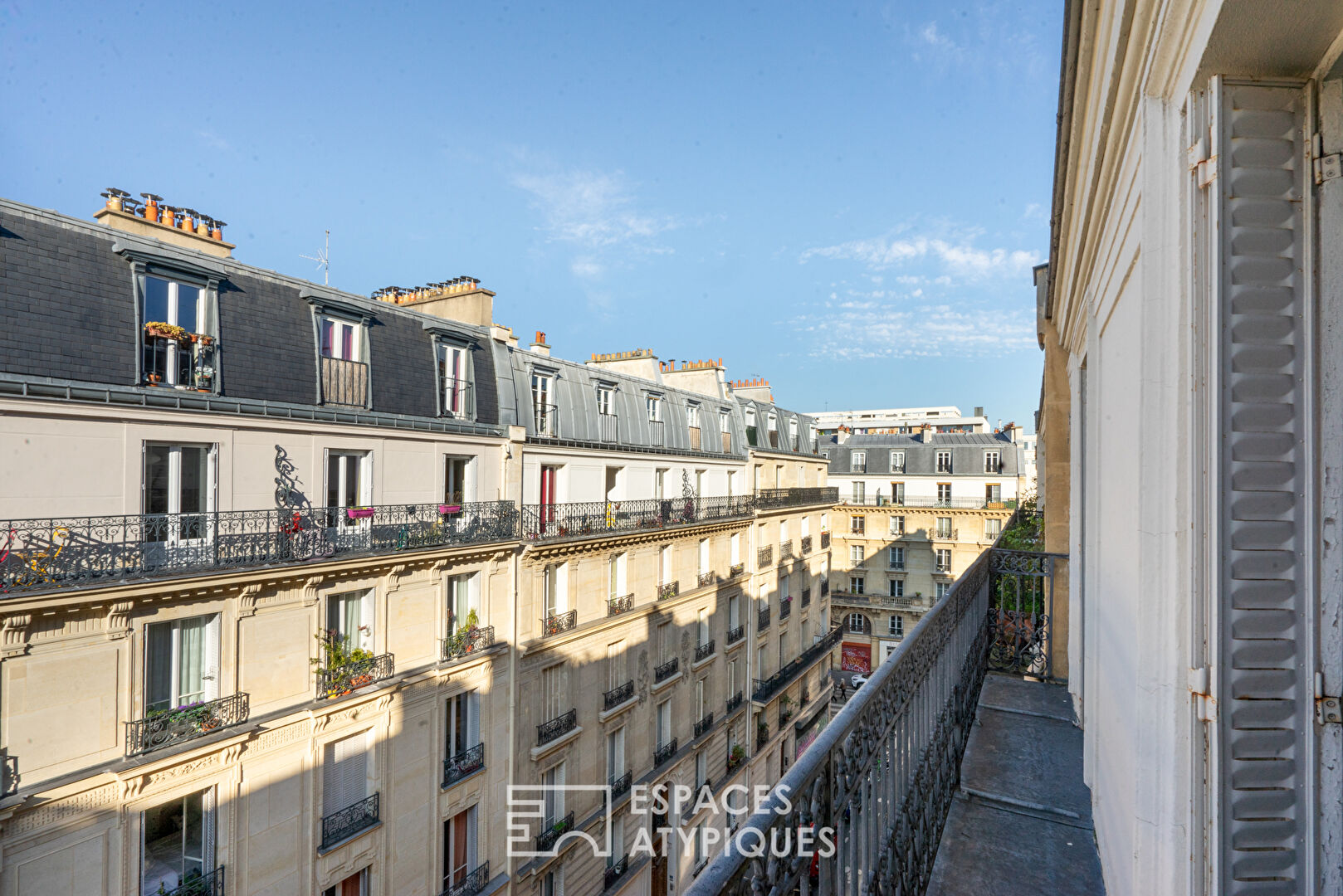 Haussmannian apartment with balcony and open view