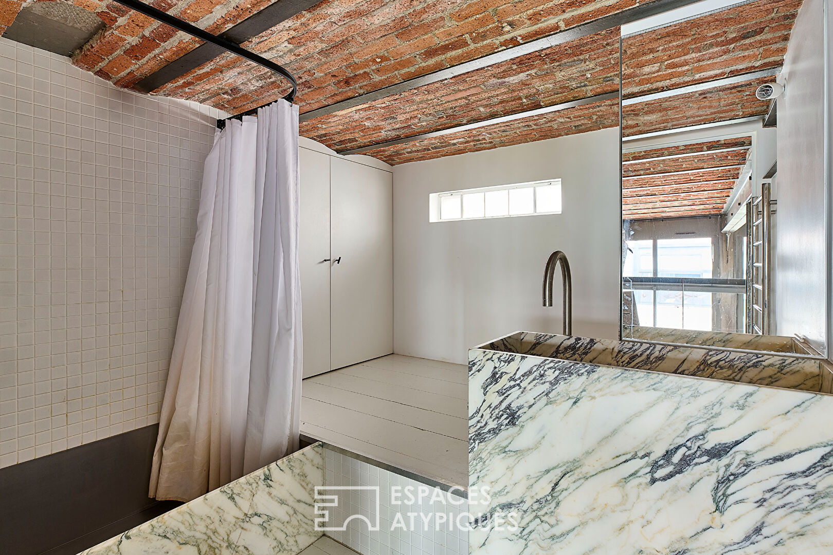 Loft d’architecte de caractère au coeur du Canal Saint-Martin